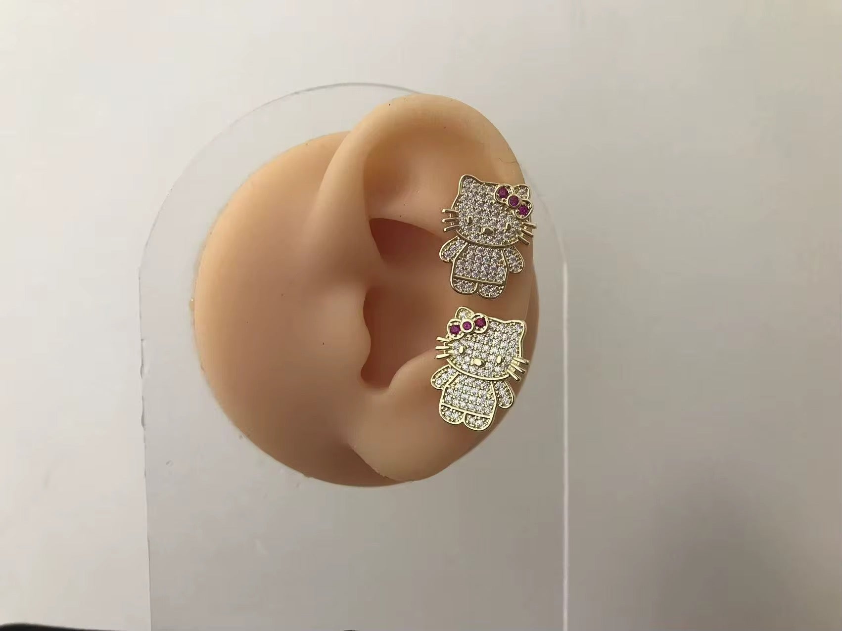 Pink Hello Kitty Stud Earrings – Gold Tone